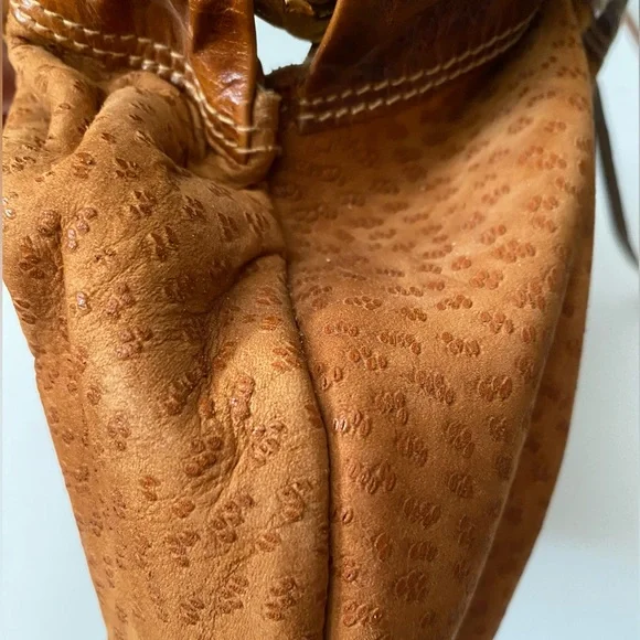 Furla Suede Vintage Brown Crossbody Gold Hardware looks like tiny cat paw prints